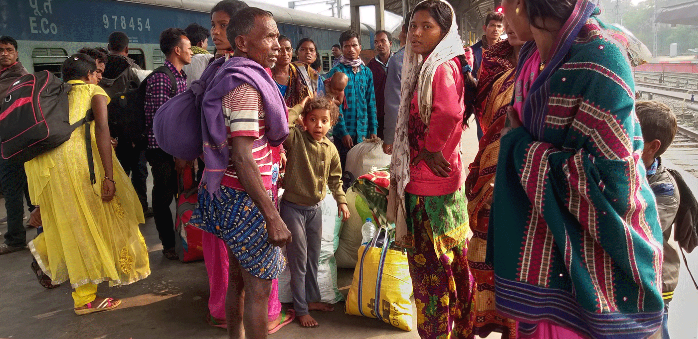Labourers at railway station 
