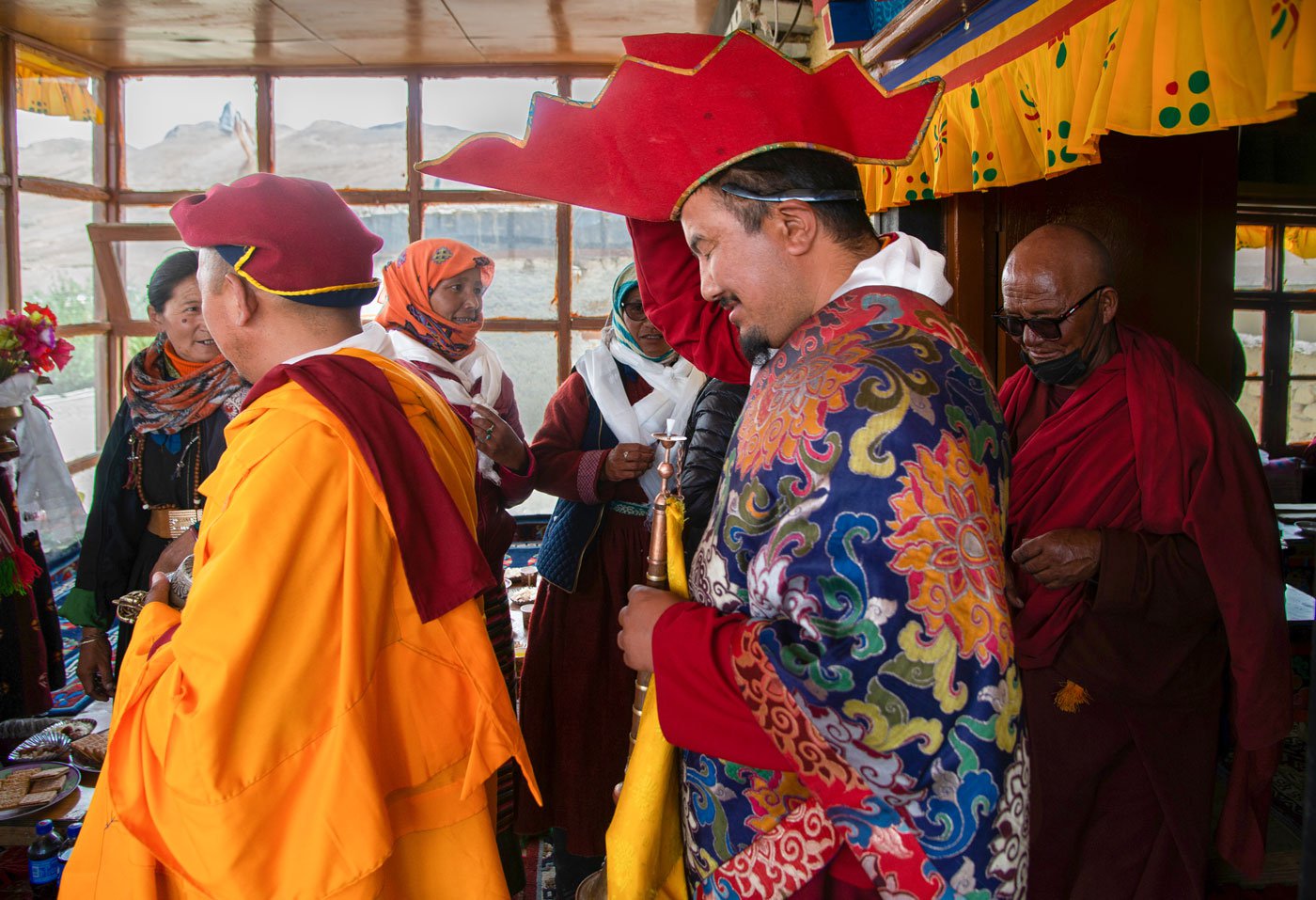 The lamas of the monastery in Hanle emerge out of the Gompa in Shado village after their prayers