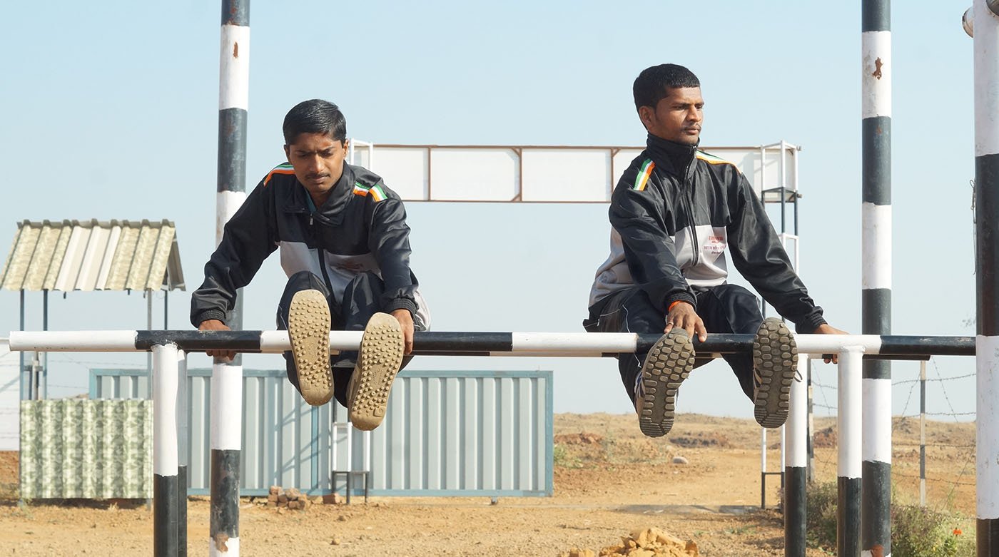 Two boys train at the Swarajya Career Academy