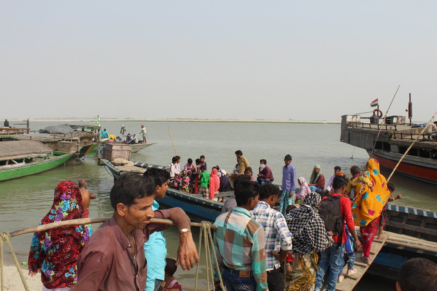 People taking boats to travel from Dhubri to Birsing
