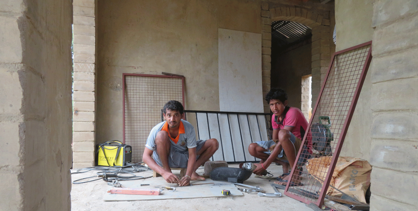 Sriram and Kumar (left to right) working at the new campus
