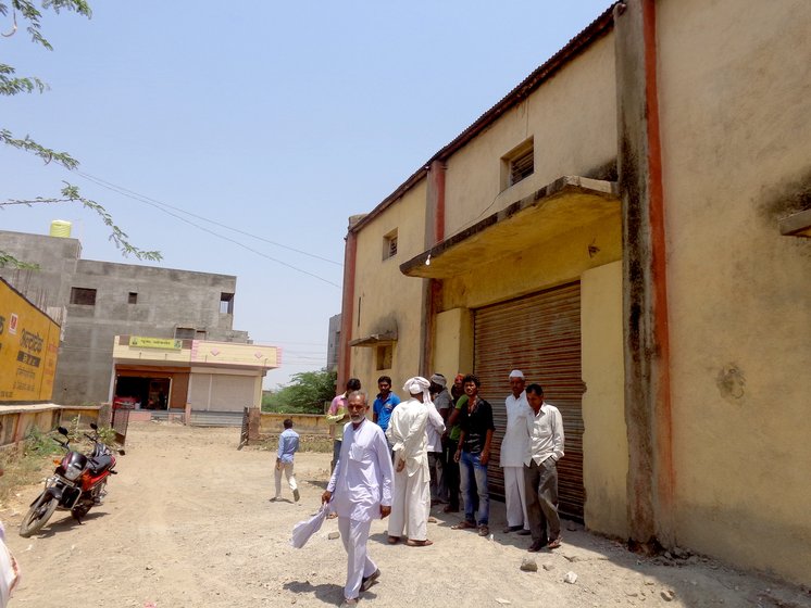 Farmers gathered outside NAFED centre in Kalamb