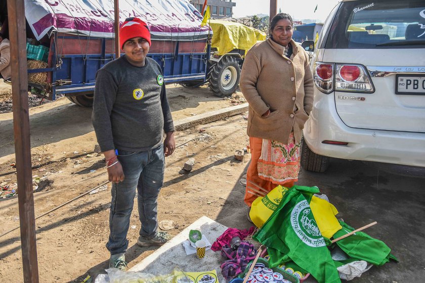 Rita Arora, who sells protest badges, flags and stickers on a street near the Singhu border, says, 'We get our food from farmers. It's impossible to ignore them'