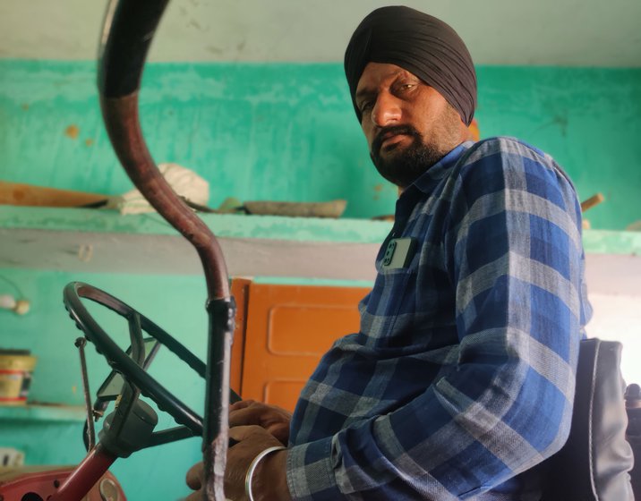 Sukhdev Singh in Saijani village on tractor