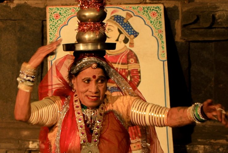 A old women performing traditional Terah Taali dance of Rajasthan