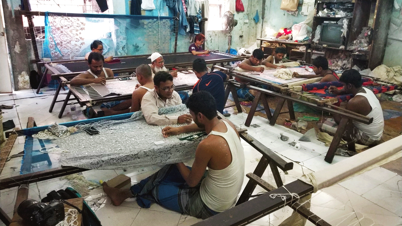Men working at a zari workshopo
