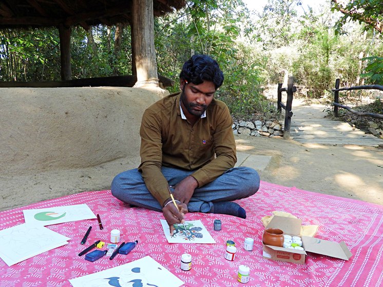 Mithlesh Kumar Shyam at the wildlife camp where he occasionally displays and sells his paintings. Like other Gond artists, he too has a distinctive style