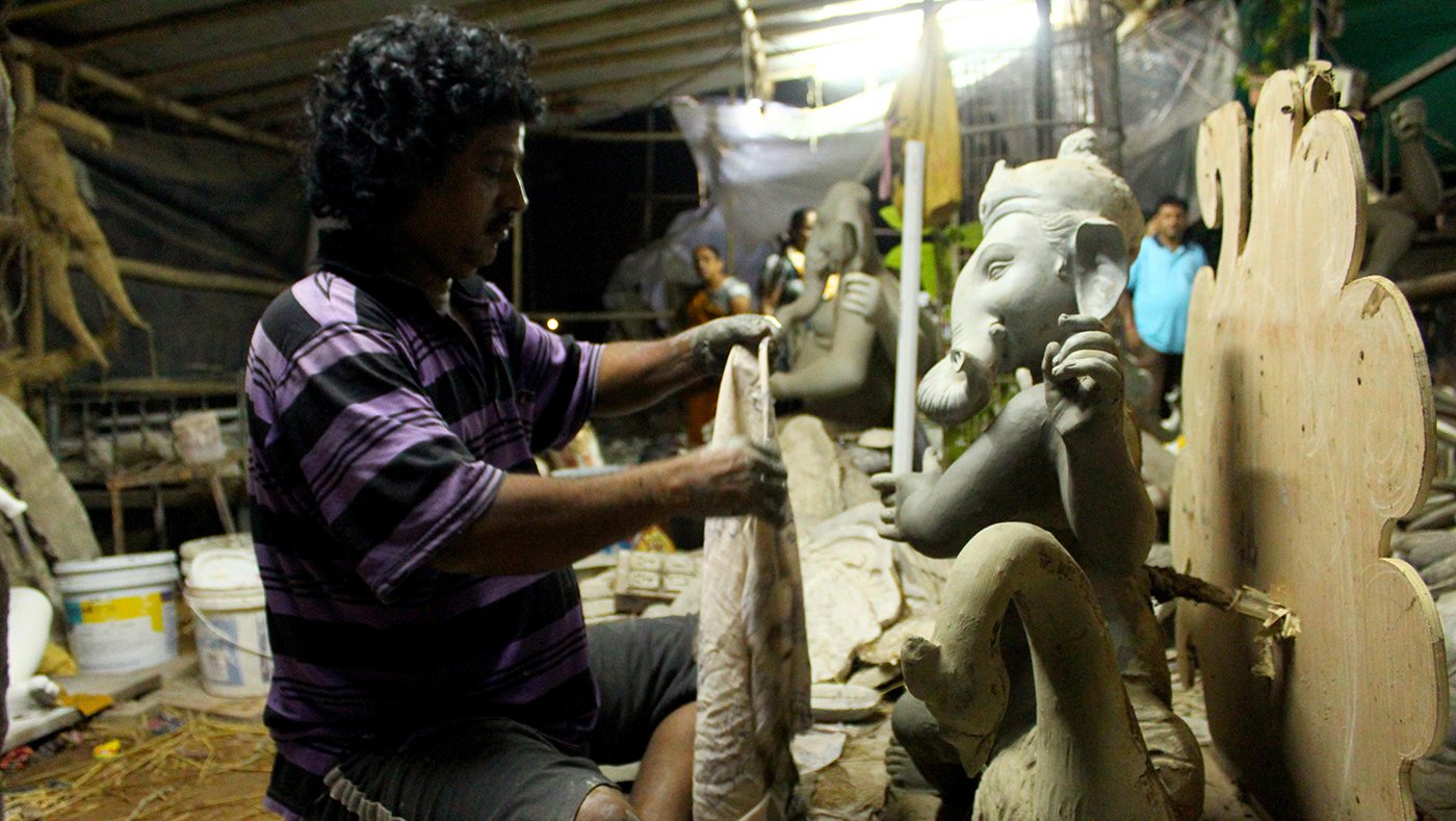 Artist making ganpati idol