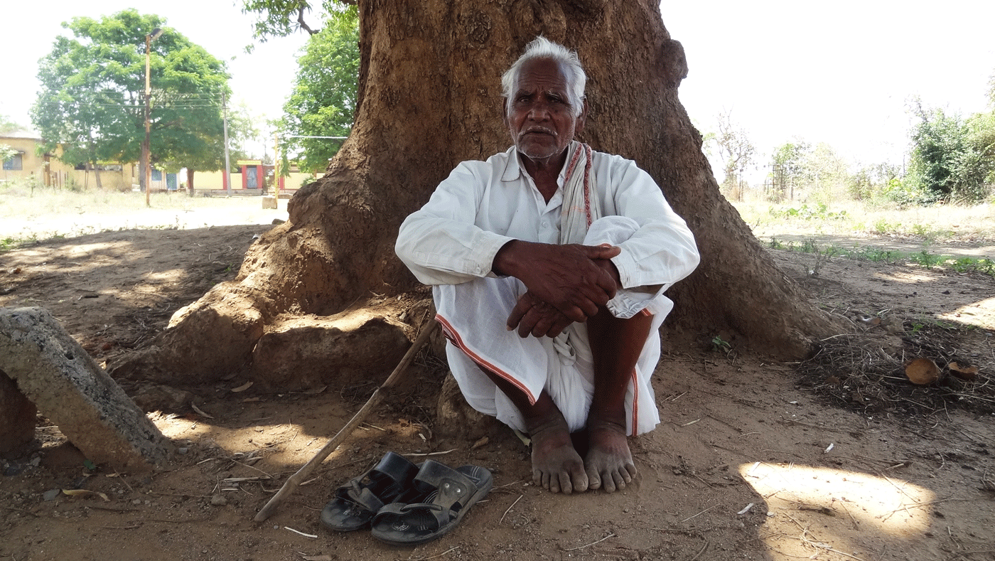 Mahadev Kamble sitting in a shade.