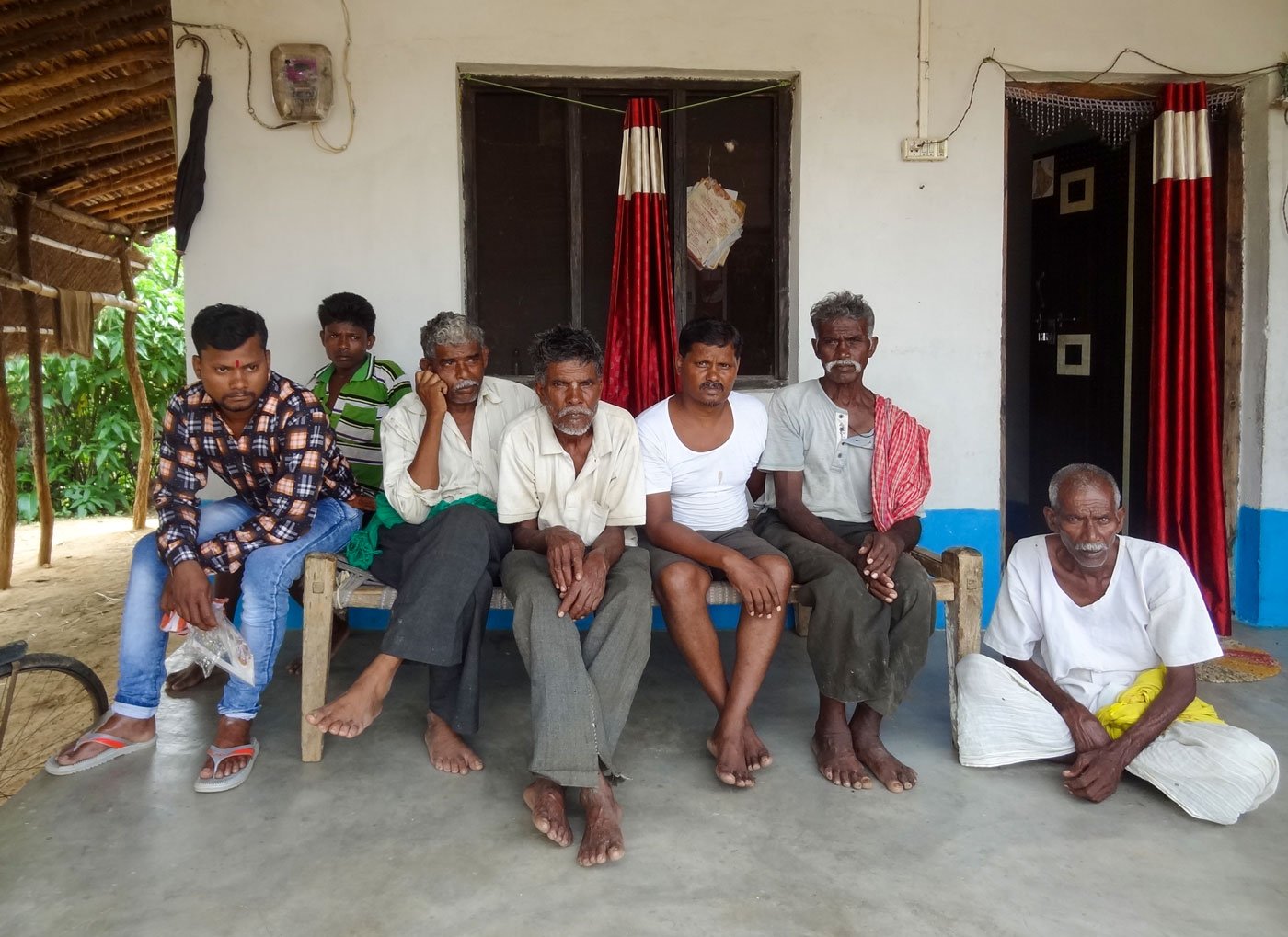 Narayan Uikey (extreme right), 70, and a veteran farmer in Garada at their home late July waiting desperately for rains. Two months have passed since the monsoon began but it hasn’t rained here enough to do the transplantation of the paddy tillers, a trend they say is now a headache in their part