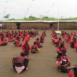 Students of Phanse Pardhi School exercising on the school grounds
