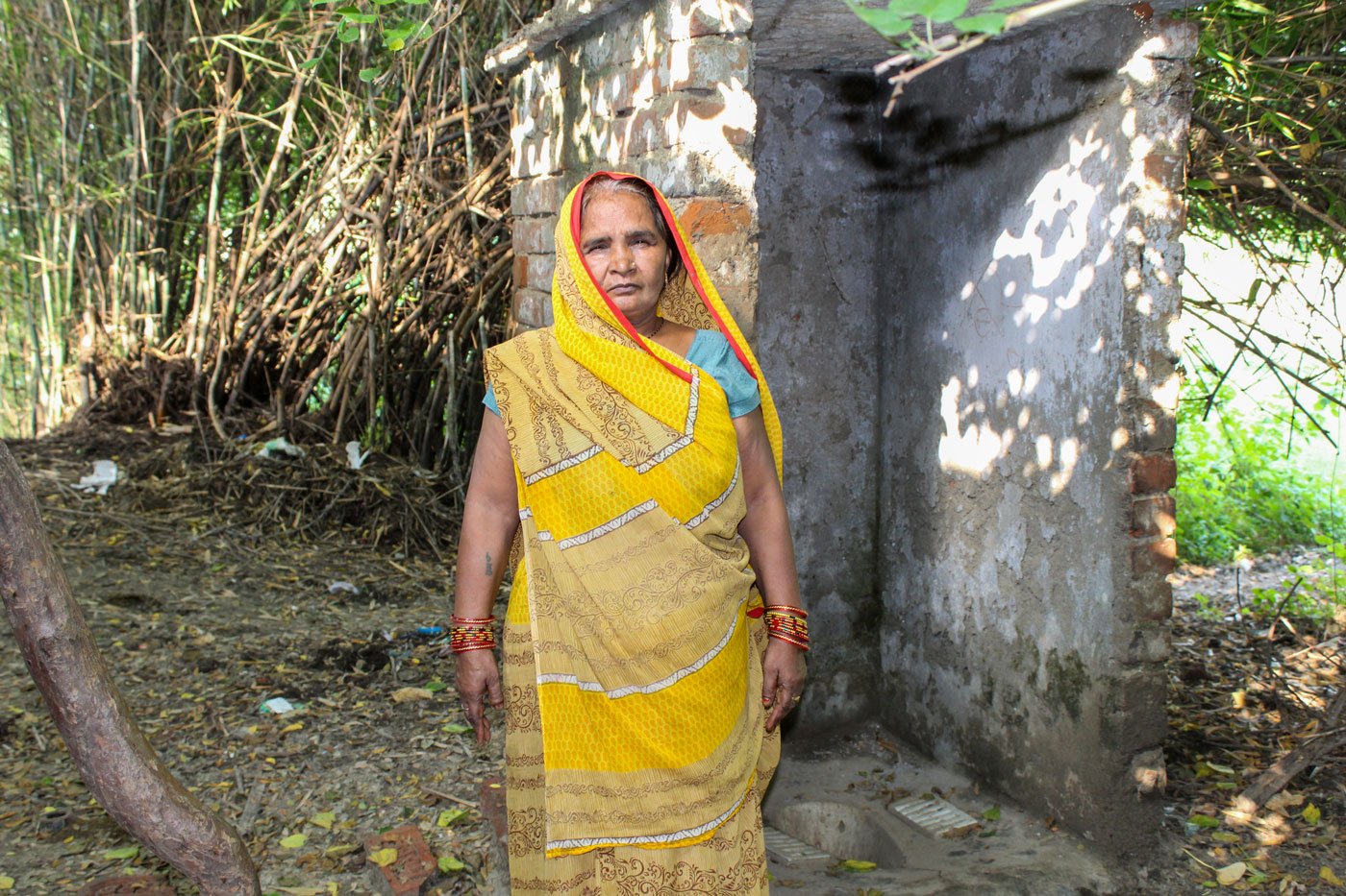 Bindeshvari shows her toilet which has no door