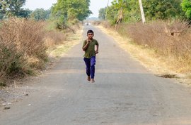 Chasing Gold on a tar road in Parbhani