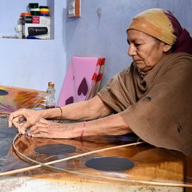 The harsh lives of the women kite makers of Khambhat and Ahmedabad stand out in stark contrast against the brilliantly coloured skies they light up with their labour