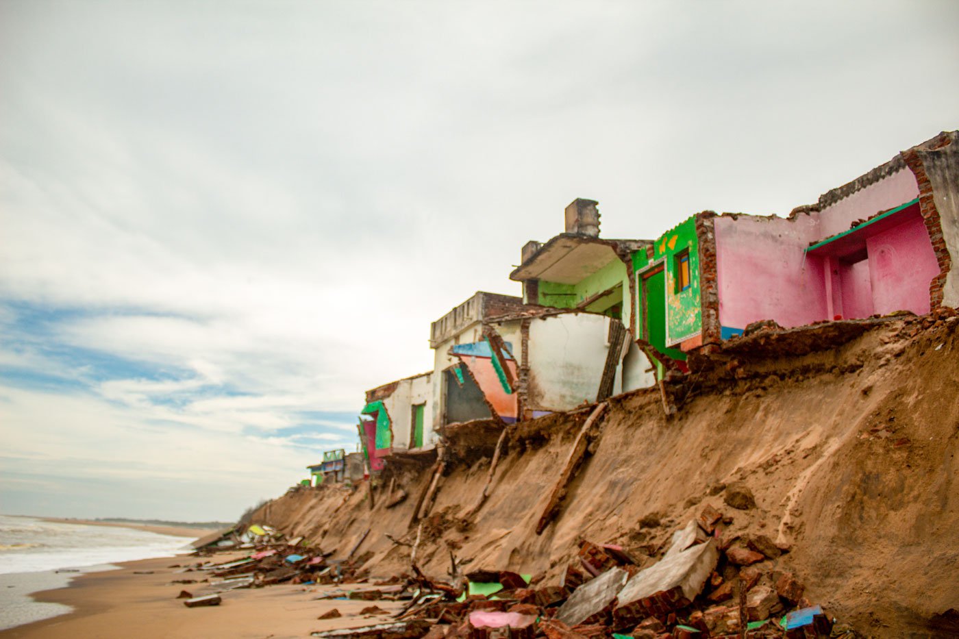 Constant erosion by the sea has damaged the houses