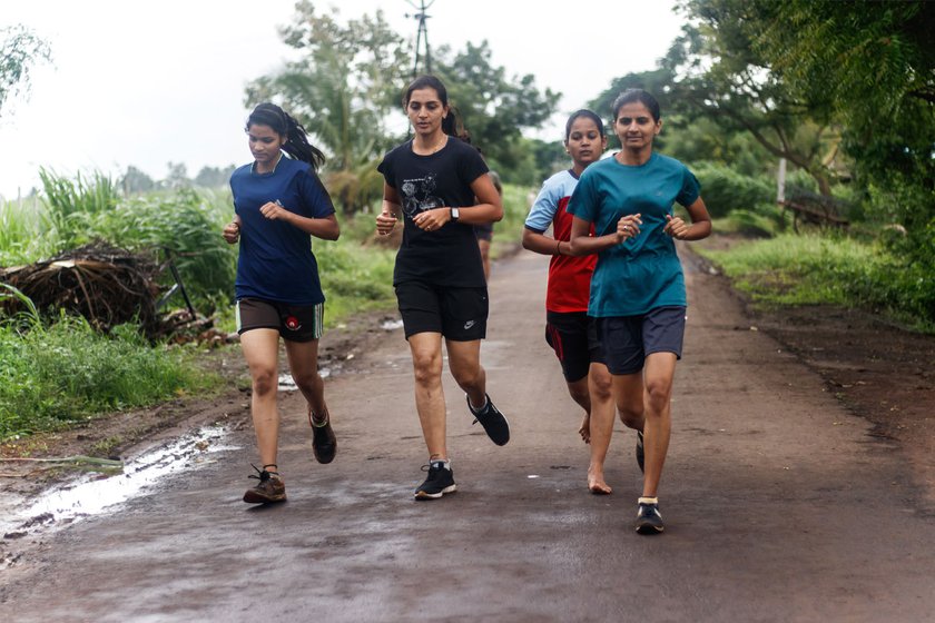 Athletes running 10 kilometres as part of their training in Maharashtra’s flood-affected Ghalwad village
