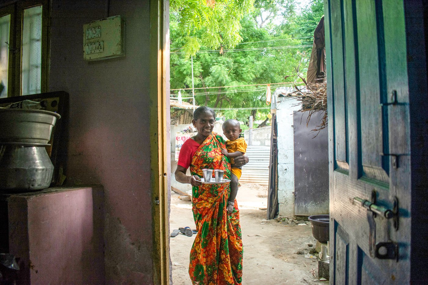 Rani at home, and with her son Kumar (right). During each pregnancy, she worked till the day of delivery – then walked to the hospital directly from the salt pans