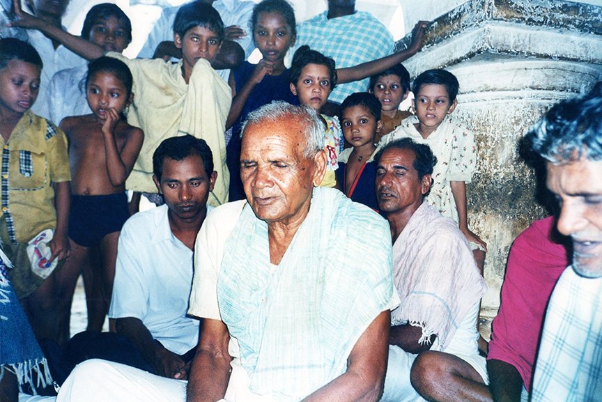 Jitendra Pradhan, 81, and others singing one of Gandhi's favourite bhajans