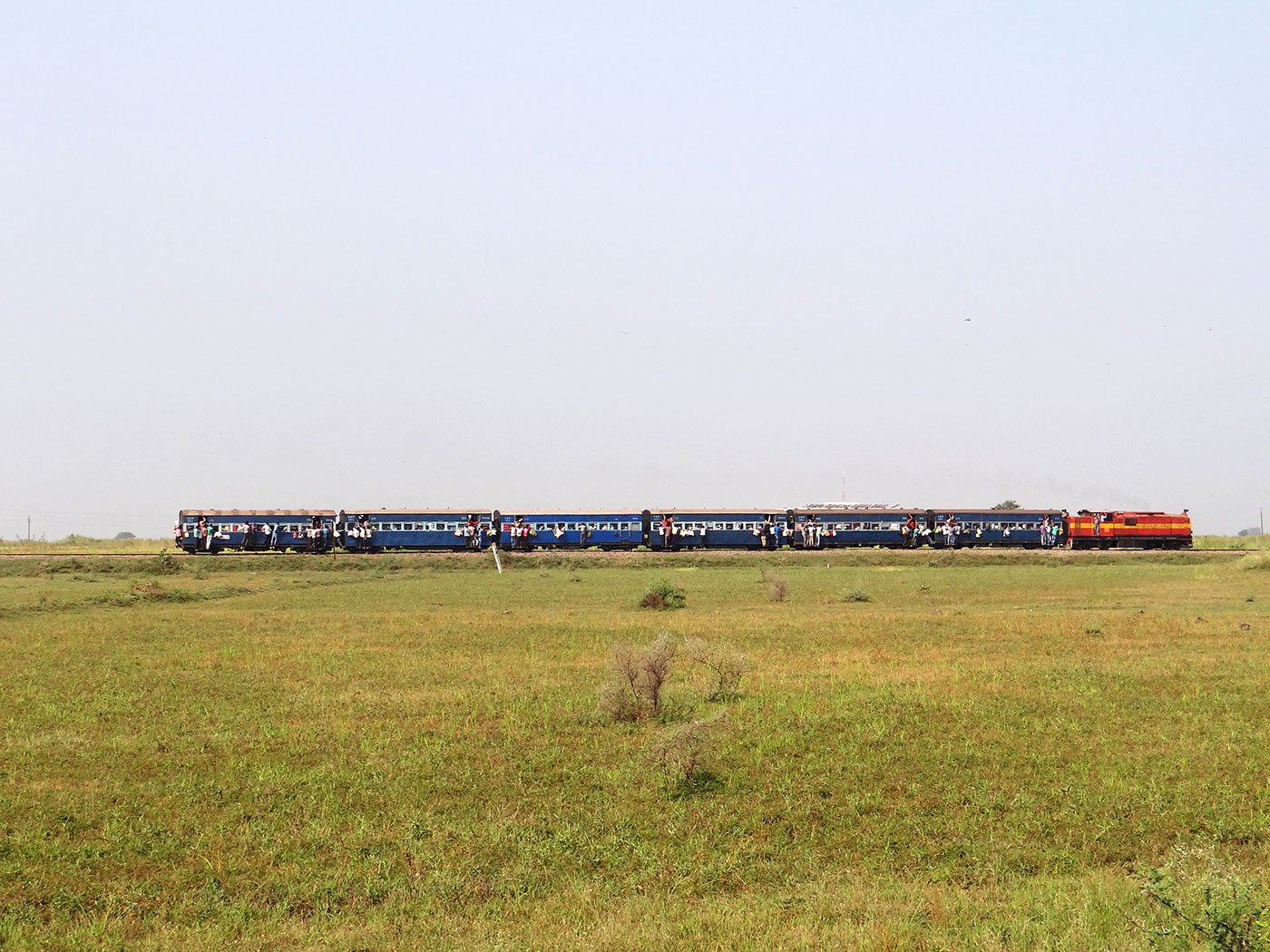 Three Labourers In A Train