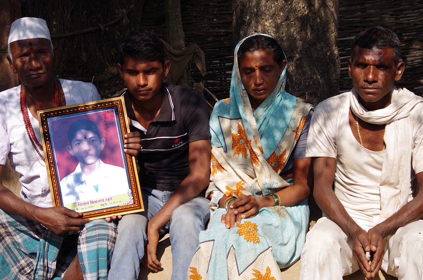In Akola’s Dadham village: Vishal's father, Vishwanath Khule and his distraught mother Sheela (on the right); elder brother Vaibhav and their neighbour Jankiram Khule, Vishal’s ‘kaka’ (on the left)