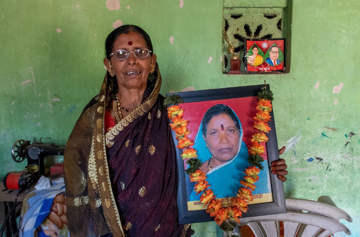Kusum Sonawane (with Shahu Kamble's photo), says that the late Shahubai had a talent for setting songs to melodious tunes