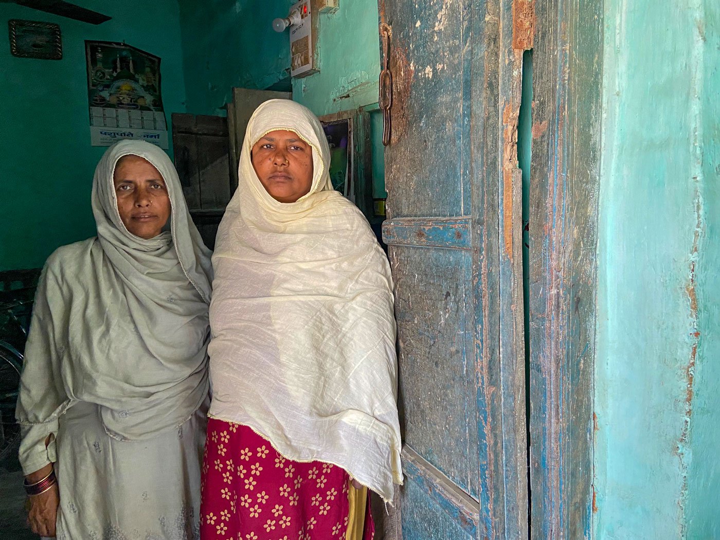 In the privacy of a little home-clinic, Salah Khatun (left) and Shama Parveen administer the intra-muscular injection