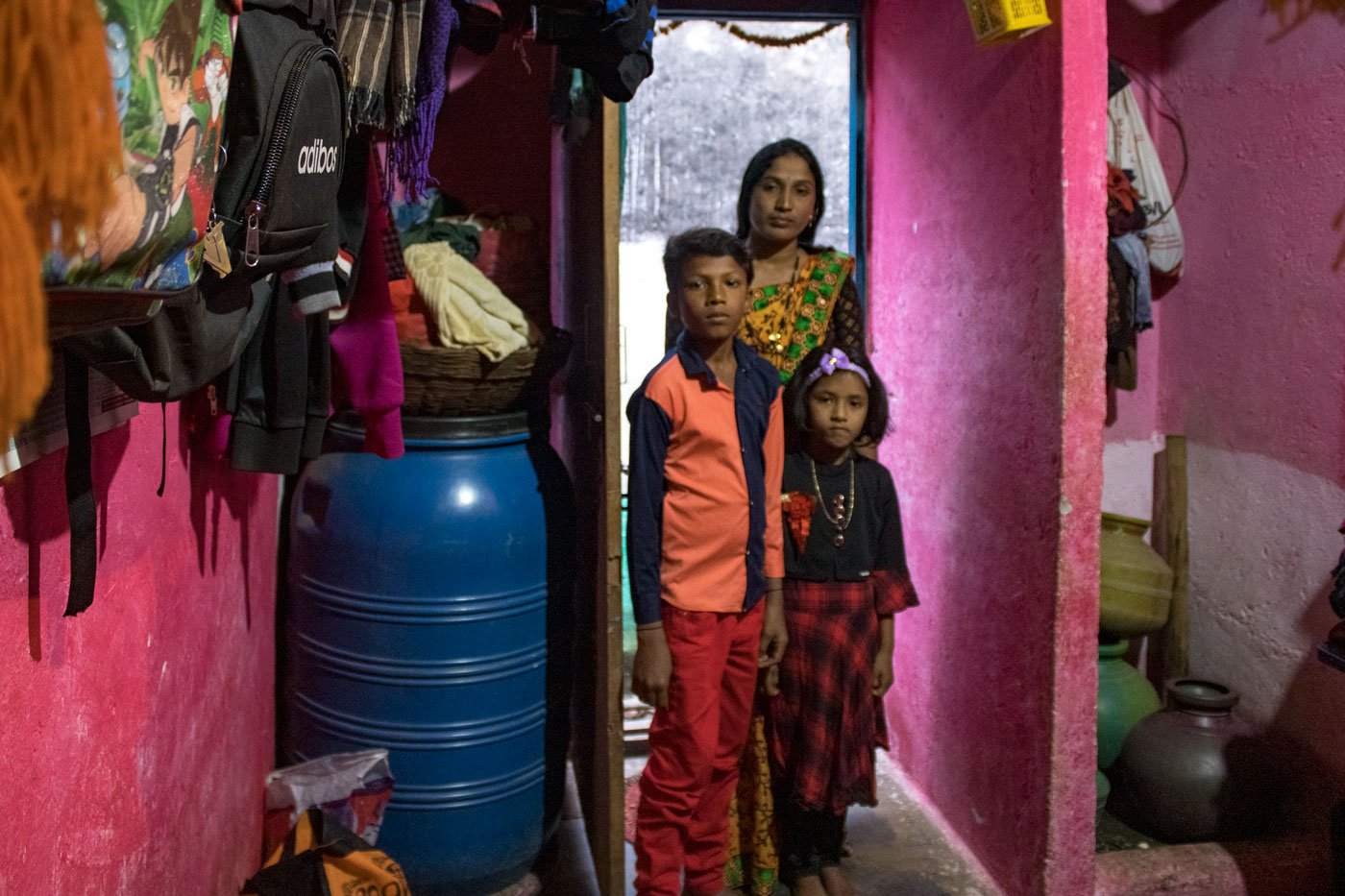 Gayathri Kachcharabi and her children in their home in the Dalit colony in Asundi village