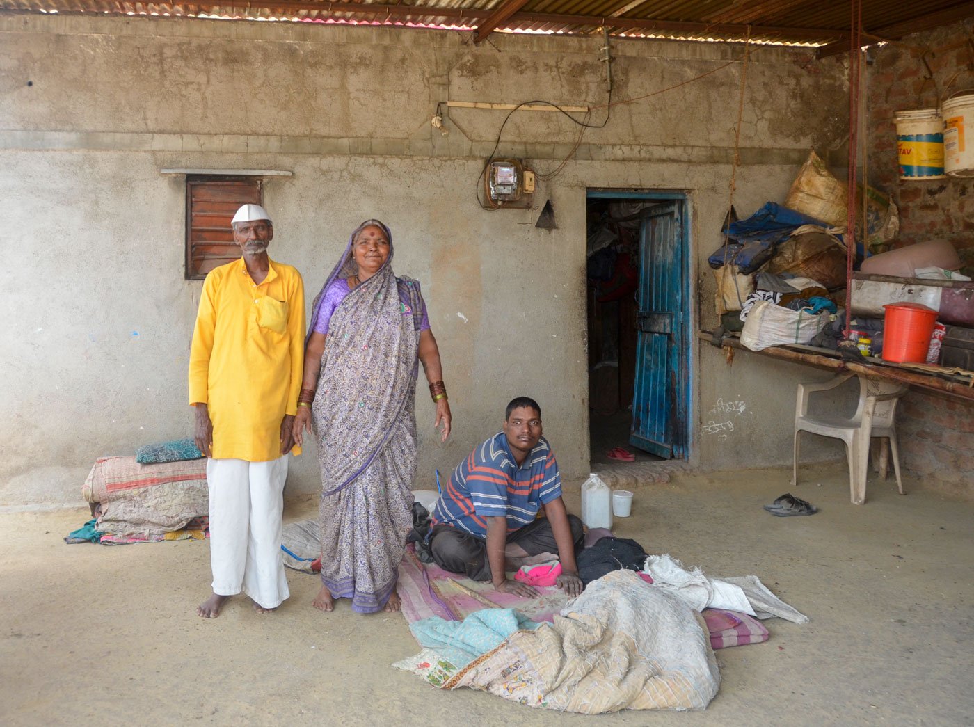 Shantabai and Dhulya Kale with their son Sandeep, at their one-room home on the outskirts of Karade village (file photo)