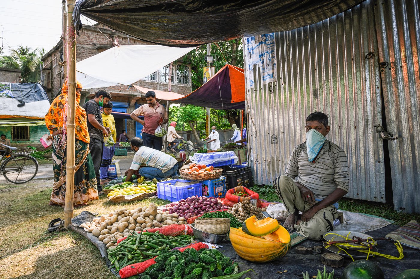Prosanto Mondal, 48, used to sell dal-puri in the mornings and potato bondas in the evening. But with lockdown restrictions on cooked street food, he began selling vegetables. From daily earnings of around Rs. 400, he now barely makes Rs. 150. "I am not very familiar with the vegetable trade,” he says.