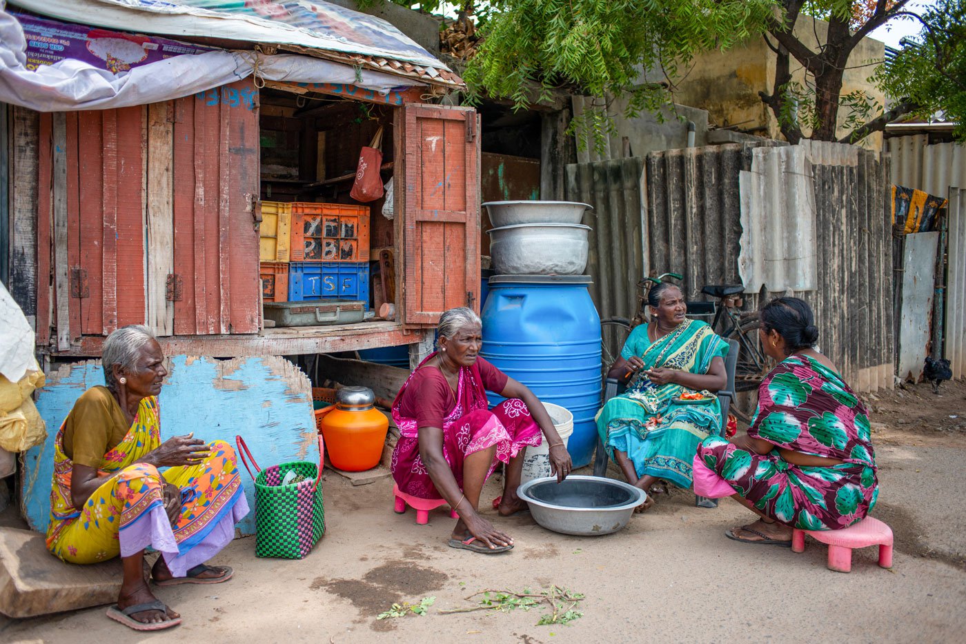 Fathima and her sisters outside their shop