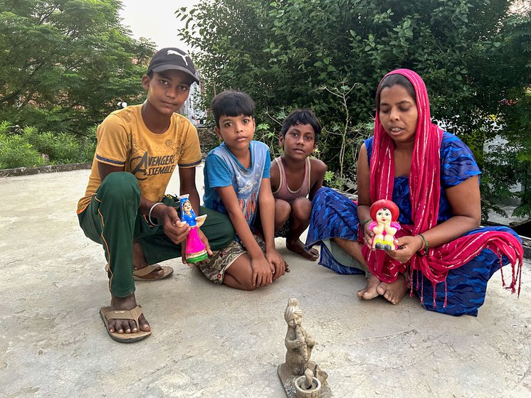 Left: Shiva Bansal (yellow t-shirt) sitting with Maya Prajapati and her two children. Both of them work as potters in Lucknow's Chinhat block.