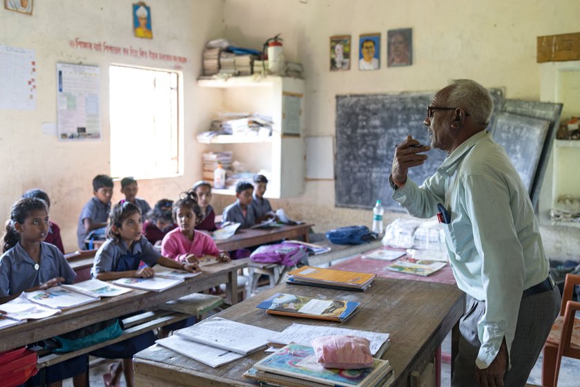 Siwjee Singh Yadav taking a lesson in the only classroom of Dhane Khana Mazdur Lower Primary School on Dabli Chapori.