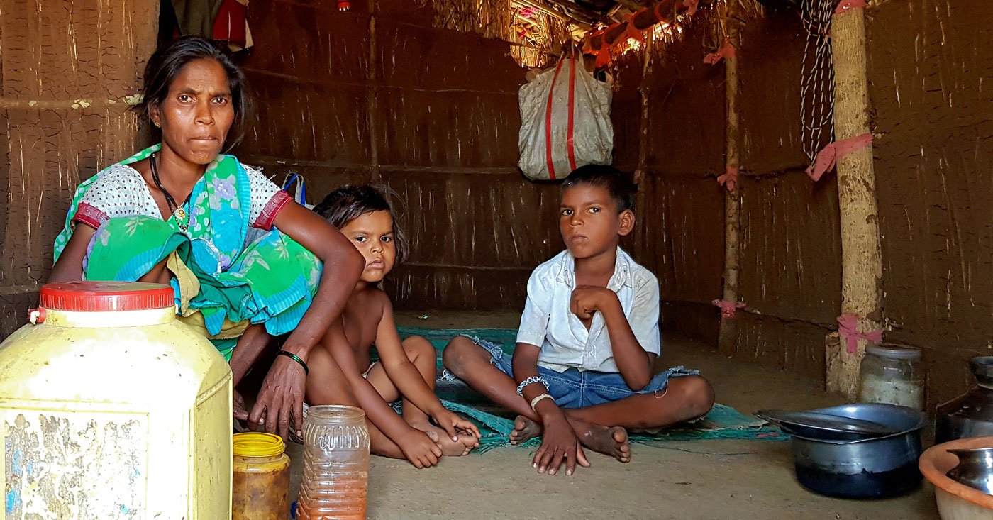 Vanita Bhoir had a week's stock of food for her family (here with her daughter Sangeeta and son Krishna) in her straw-and-mud hut