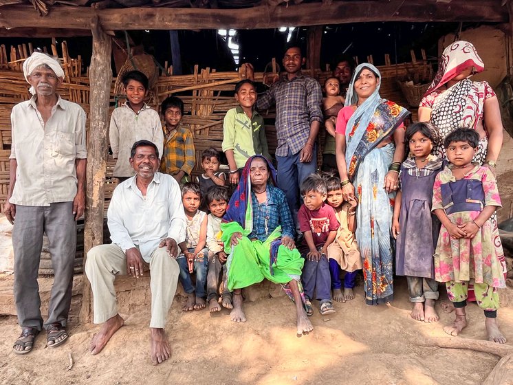 Left: Ungya Pawara and his immediate family in front of their home in Ambapani .