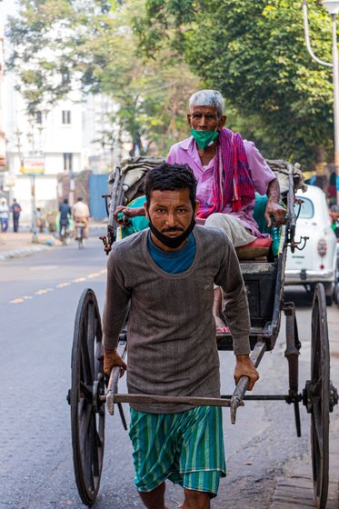 'I can easily pull the rickshaw with two passengers, even three, if the third is a child,' says Lallan, who came to Kolkata from Bihar 15 years ago

