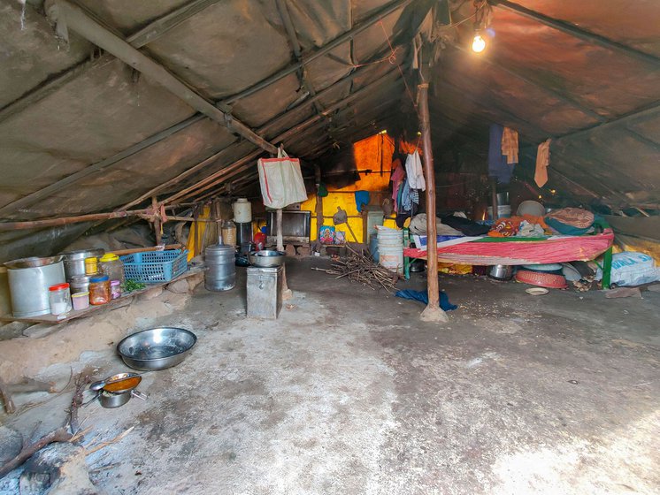 Left: Nomadic families live in make-shift tarpaulin tents supported by bamboo poles.