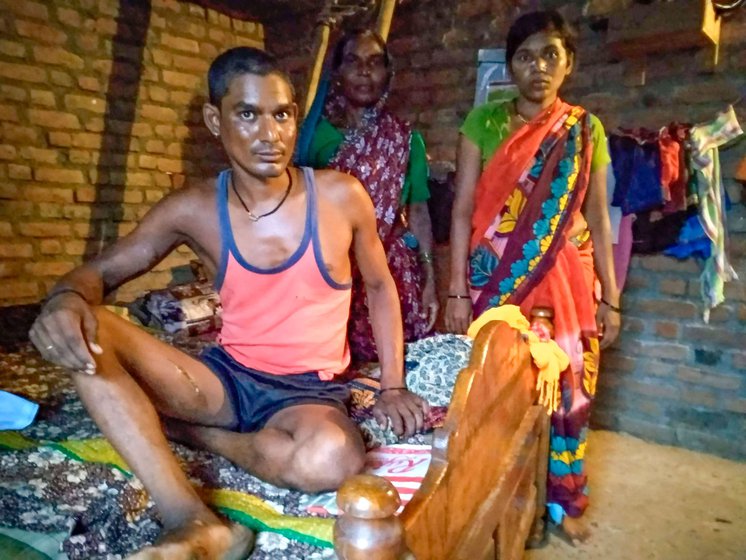 Sudhir Kosare recuperating from a wild boar attack that happened in July 2023. H e is with his wife, Darshana, and mother, Shashikala, in his house in Kawathi village of Saoli tehsil . Sudhir suffered many injuries including a deep gash (right) in his right foot.