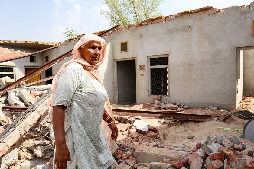Left: Baldev Kaur standing amidst the remains of her home in Bhalaiana, Sri Muktsar Sahib district of Punjab. The house was built by her family on their farmland.
