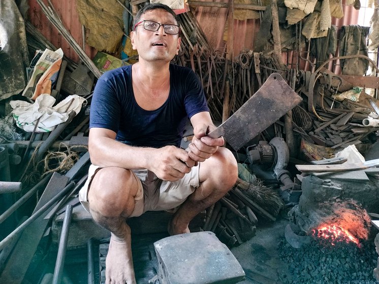 Rajesh Chaphekar, a blacksmith in Vasai taluka's Actan village with a sickle (left) made by him.