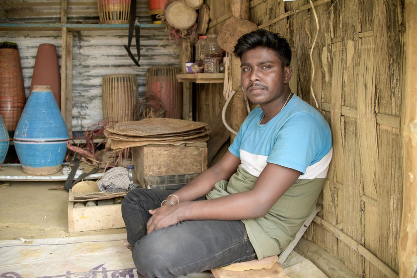 Left: Podum Badyokar sits in his family’s shop in Majuli, Assam.