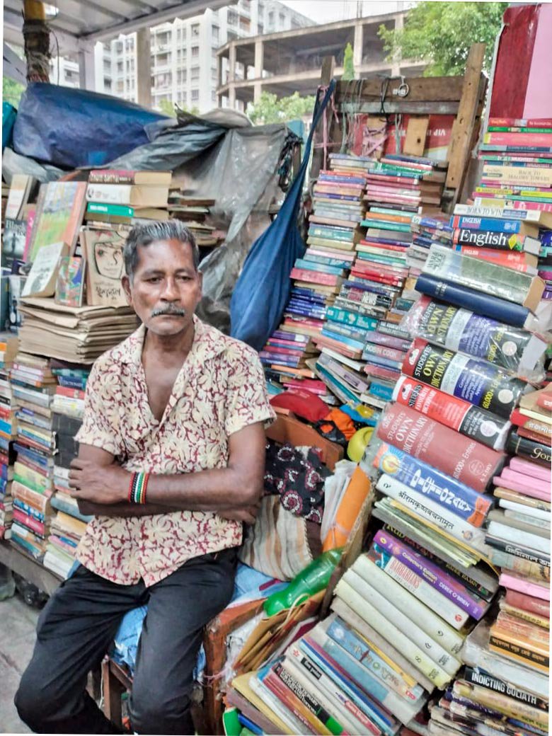 Left: Mohan Das sitting in front of his book stall in Kolkata's Gariahat market.