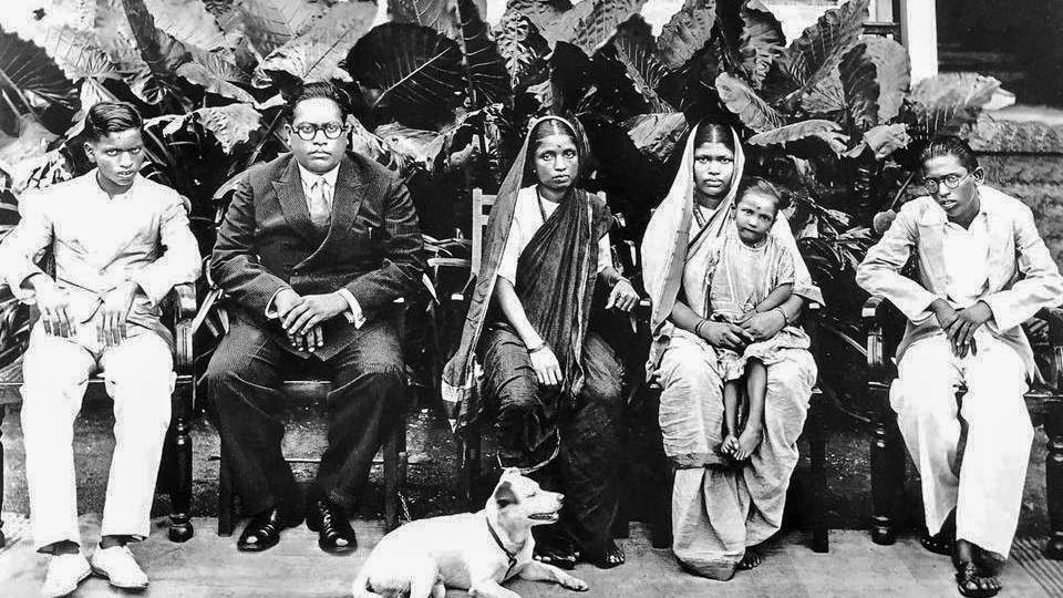 At their Rajagriha bungalow, Bombay in February 1934. From left:  son Yashwant, Dr. Ambedkar, Ramabai, Babasaheb's brother's wife Laxmibai, nephew Mukundrao, and their dog Tobby