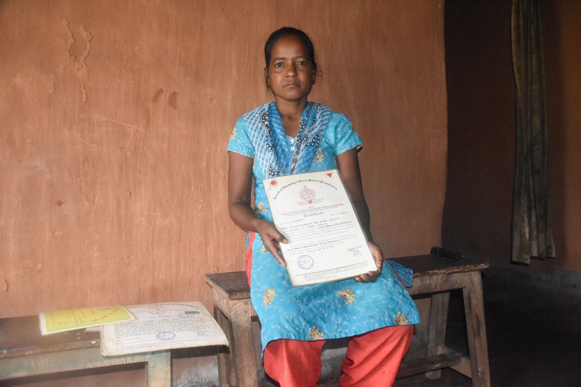 Jyoti with a certificate of Family Welfare and Health Education Training Programme, awarded to her by the Council of Unemployed Rural Medical Practitioners