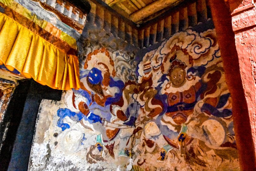 Right: Traditional Buddhist paintings from the 14-15th century on the walls of Matho monastery