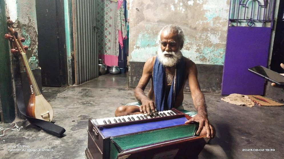 Right: Back home, Sukumar likes to sing while playing music on his harmonium and dotara