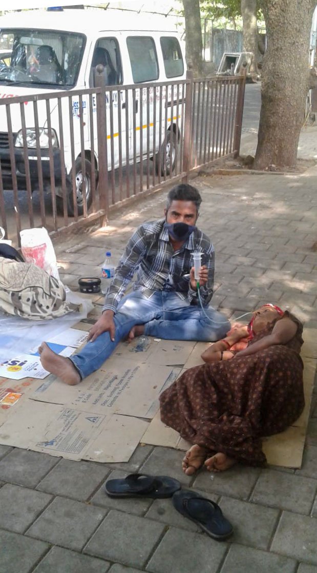 Satender and Geeta Singh lived on the footpath for two days, where rats scurry around, before shifting to their relative's place in Dombivali (left). They had moved back to the footpath outside Mumbai's Tata Memorial Hospital two weeks ago (right)

