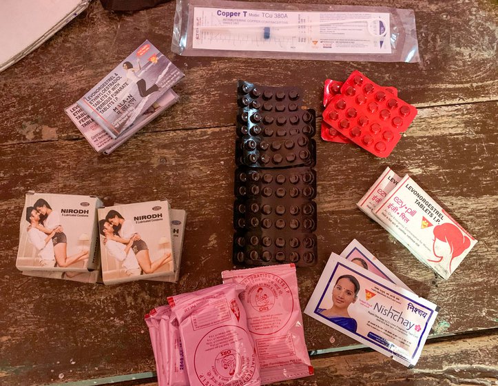 Some of the typical items that an ASHA carries to distribute – condoms, contraceptive pills, ORS sachets, iron supplements – are also found in Kalavati's bag