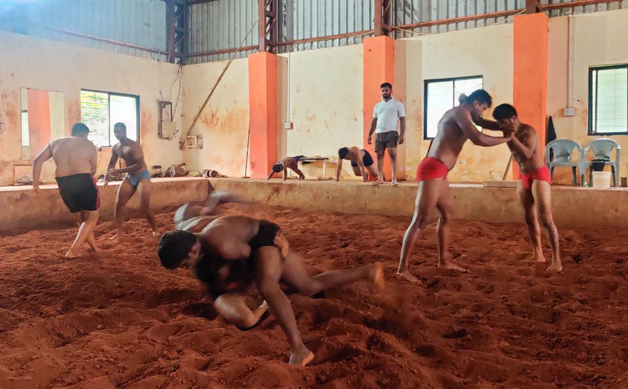 Left: Rushikesh Ghadge moved from Latur to Osmanabad to train in wrestling. Right: Practice session in the wrestling pit at Hatlai Kusti Sankul in Osmanabad