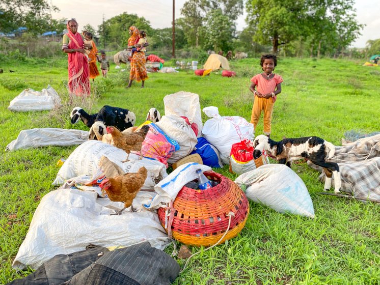 In June, Prakash’s family – including his daughter Manisha, and grandchildren (left) – and others from this group of Dhangars had halted in Maharashtra's Vada taluka

