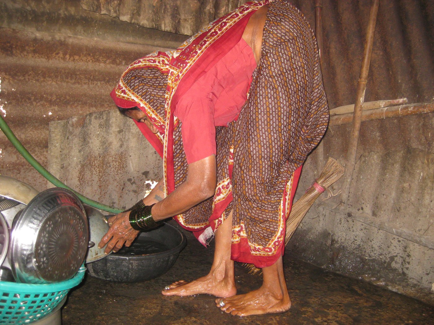 Bibabai resumed strenuous farm labour soon after a hysterectomy, with no belt to support her abdominal muscles

